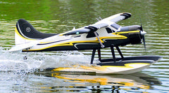 118" DH Beaver with floats landing on a lake