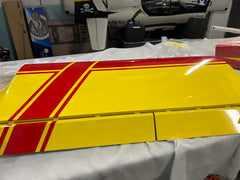 red and yellow drastik 50cc top of the wing