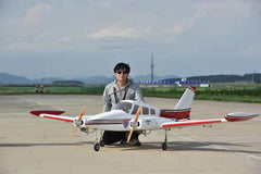 126" Cessna 310 parked on a runway