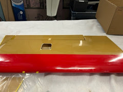 underside of a .60 drastik red and yellow plane