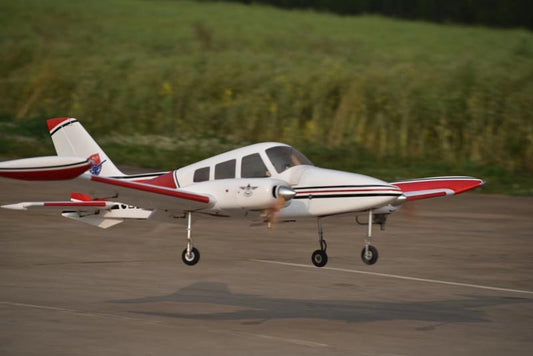 126" Cessna 310 landing on a runway